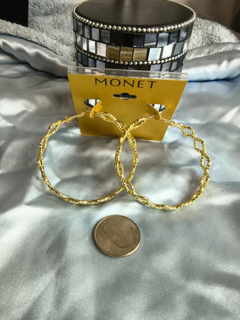 Monet Gold Tone Criss Cross Hoop earrings